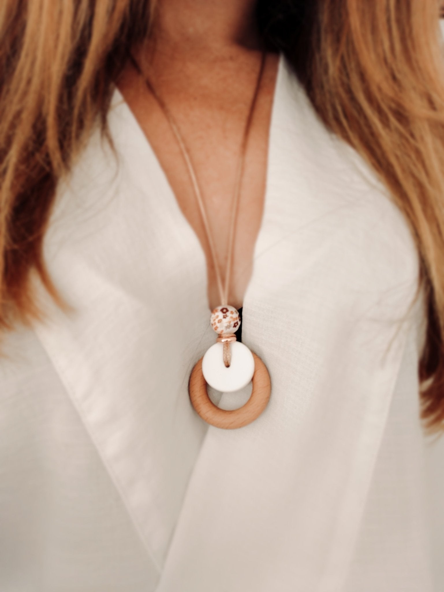 Autumn Blossom Pendant shown worn by mum.