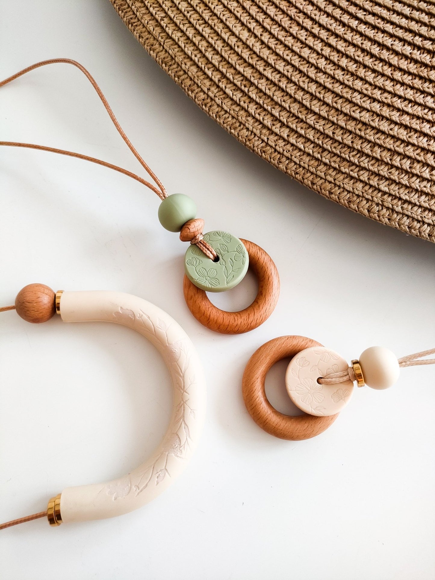 Embossed Lint Bloom Pendant - Bennie Blooms Breastfeeding, Teething and Fiddle Jewellery at its finest.