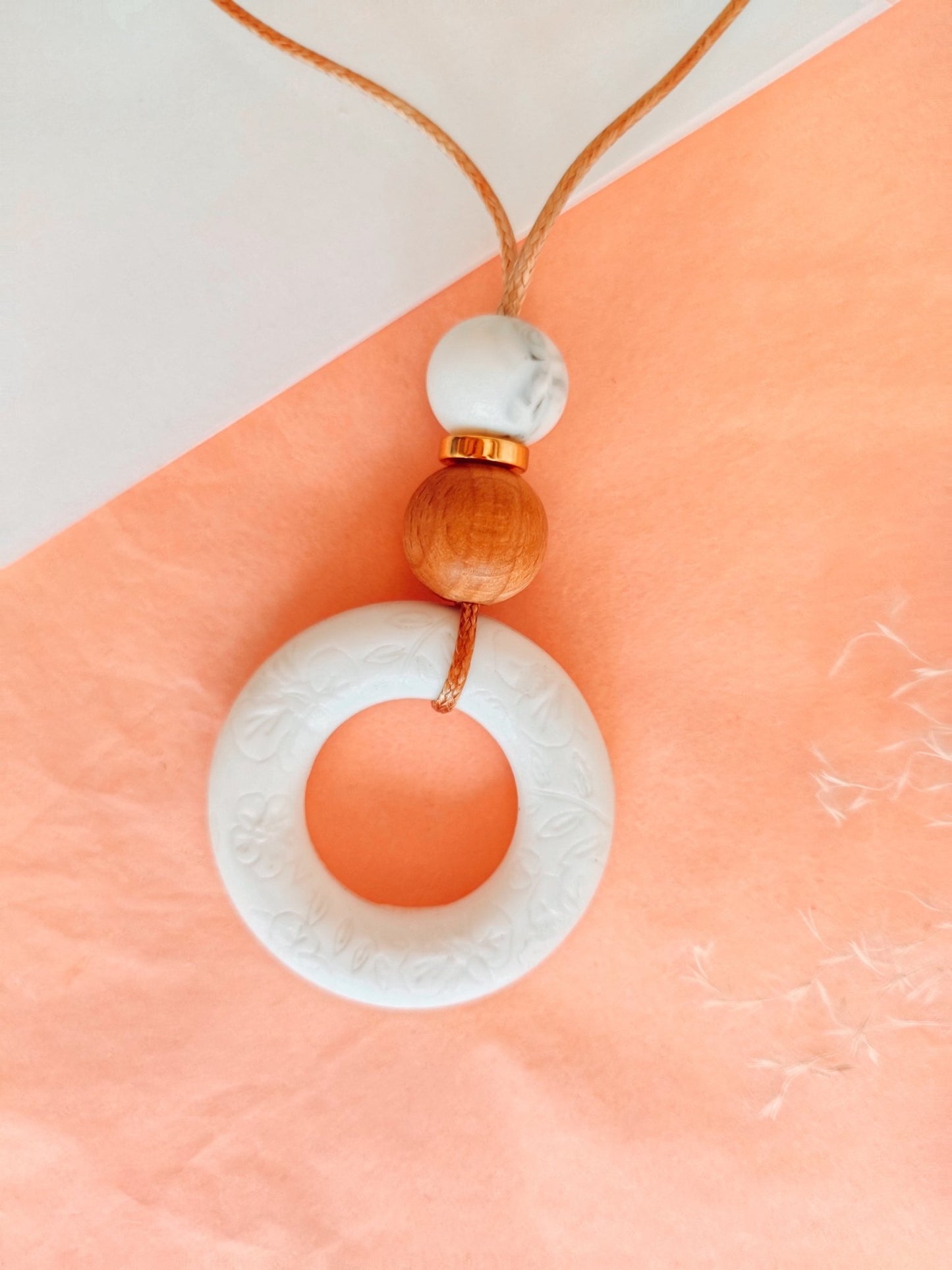 Embossed Soft Bloom white Pendant - Bennie Blooms Breastfeeding, Teething and Fiddle Jewellery at its finest.