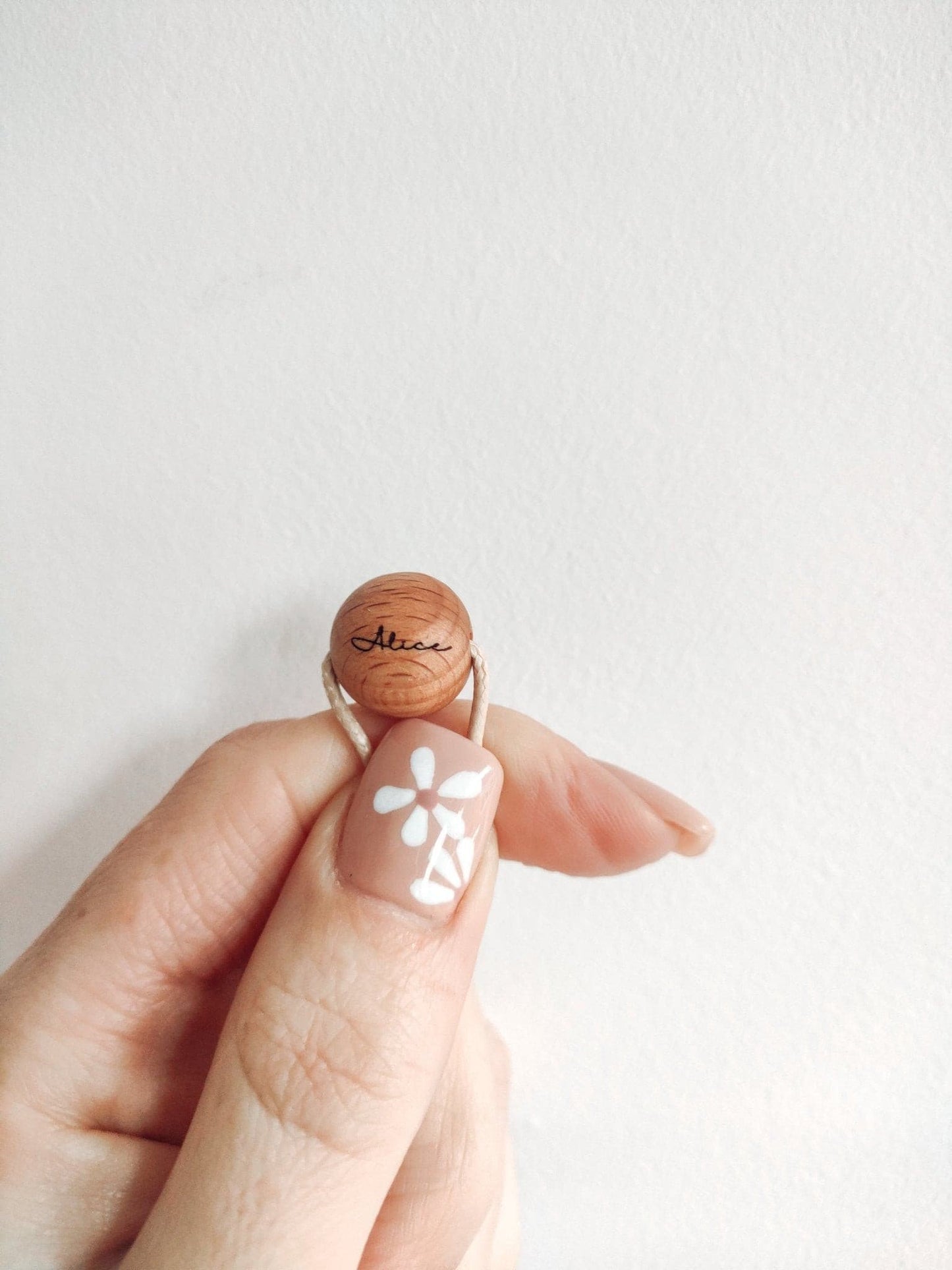 Example of personalisation on our Nudes Blossom Weight Pendant - Bennie Blooms Breastfeeding, Teething and Fiddle Jewellery at its finest.