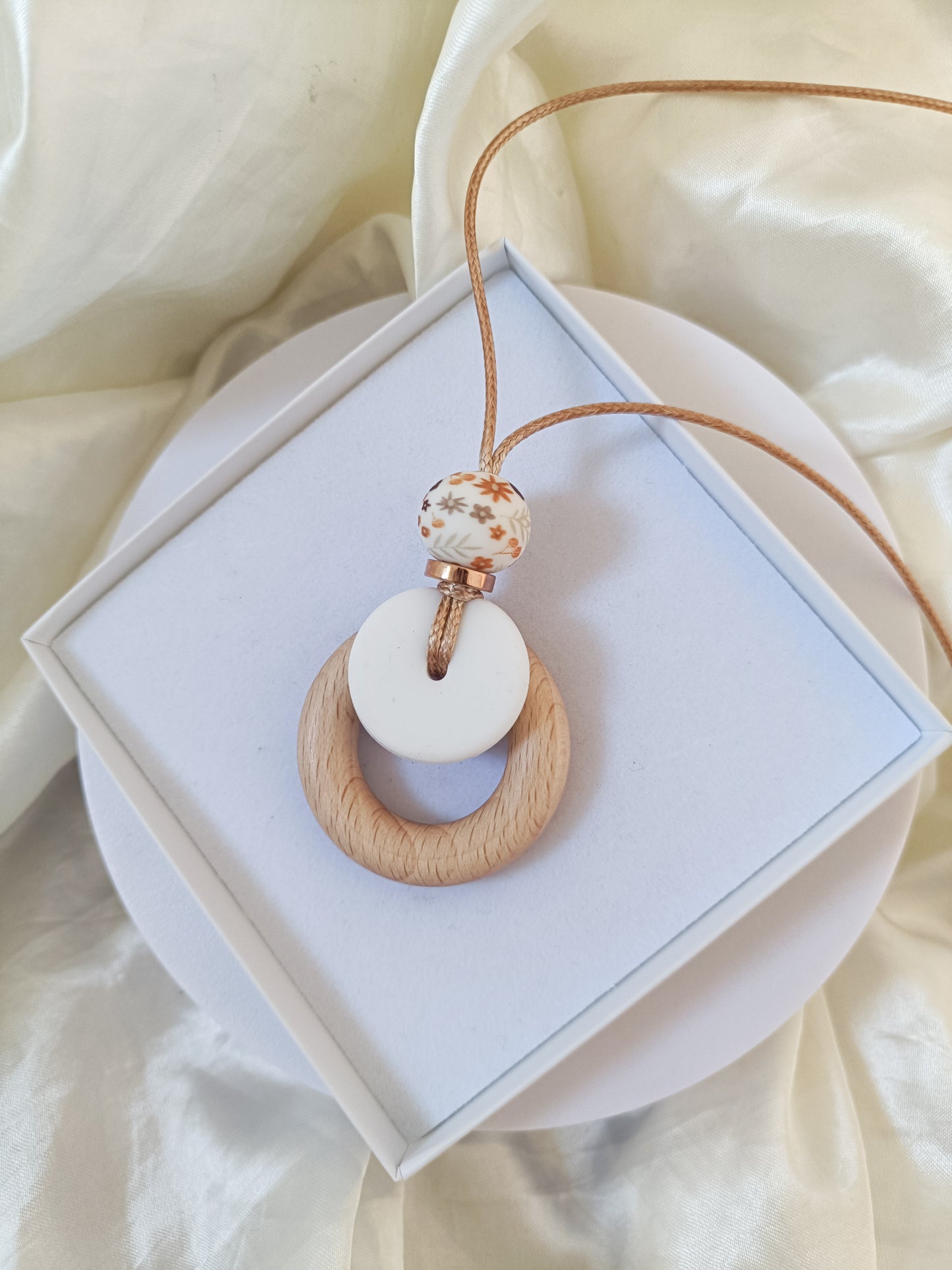 floral breastfeeding and teething pendant with personalisation