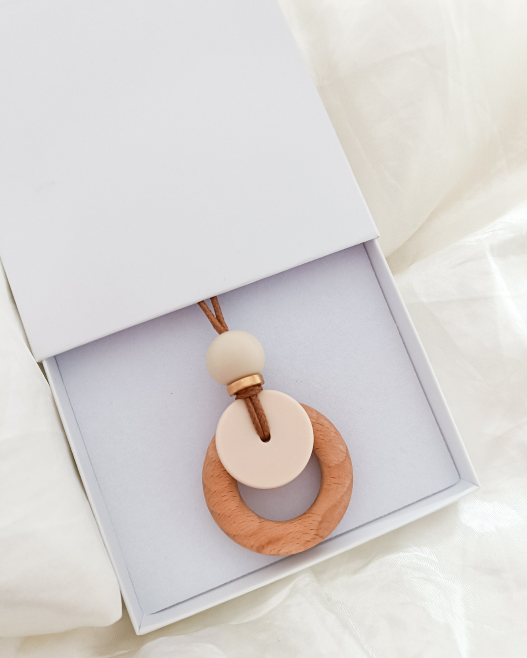 Cream Nursing Pendant