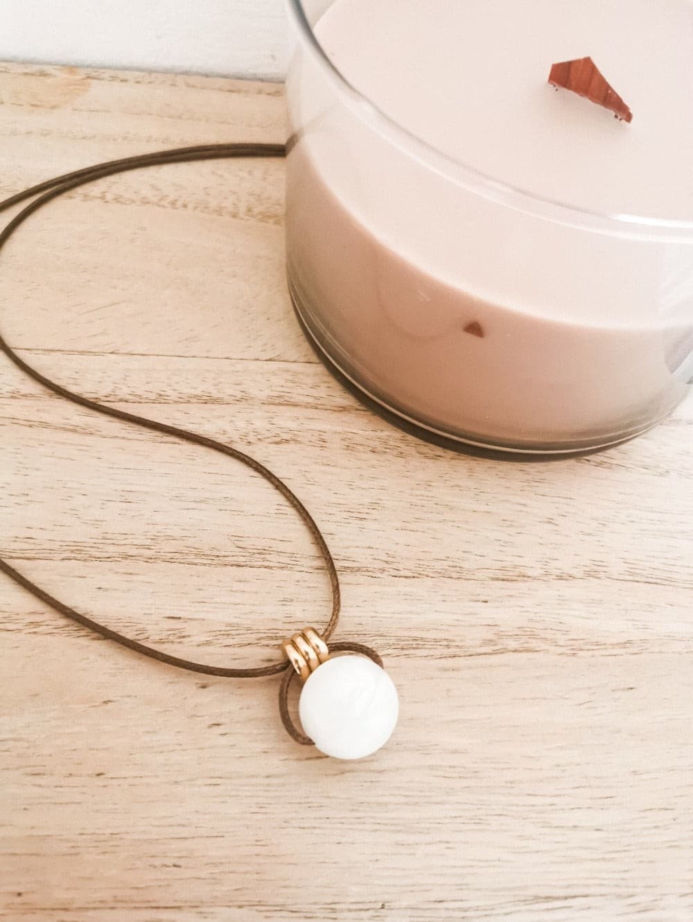 The Antique Pearl Breastfeeding & teething Necklace with gold detail is perfect for fiddling, chewing or playing with whilst nursing or teething, worn by mum.