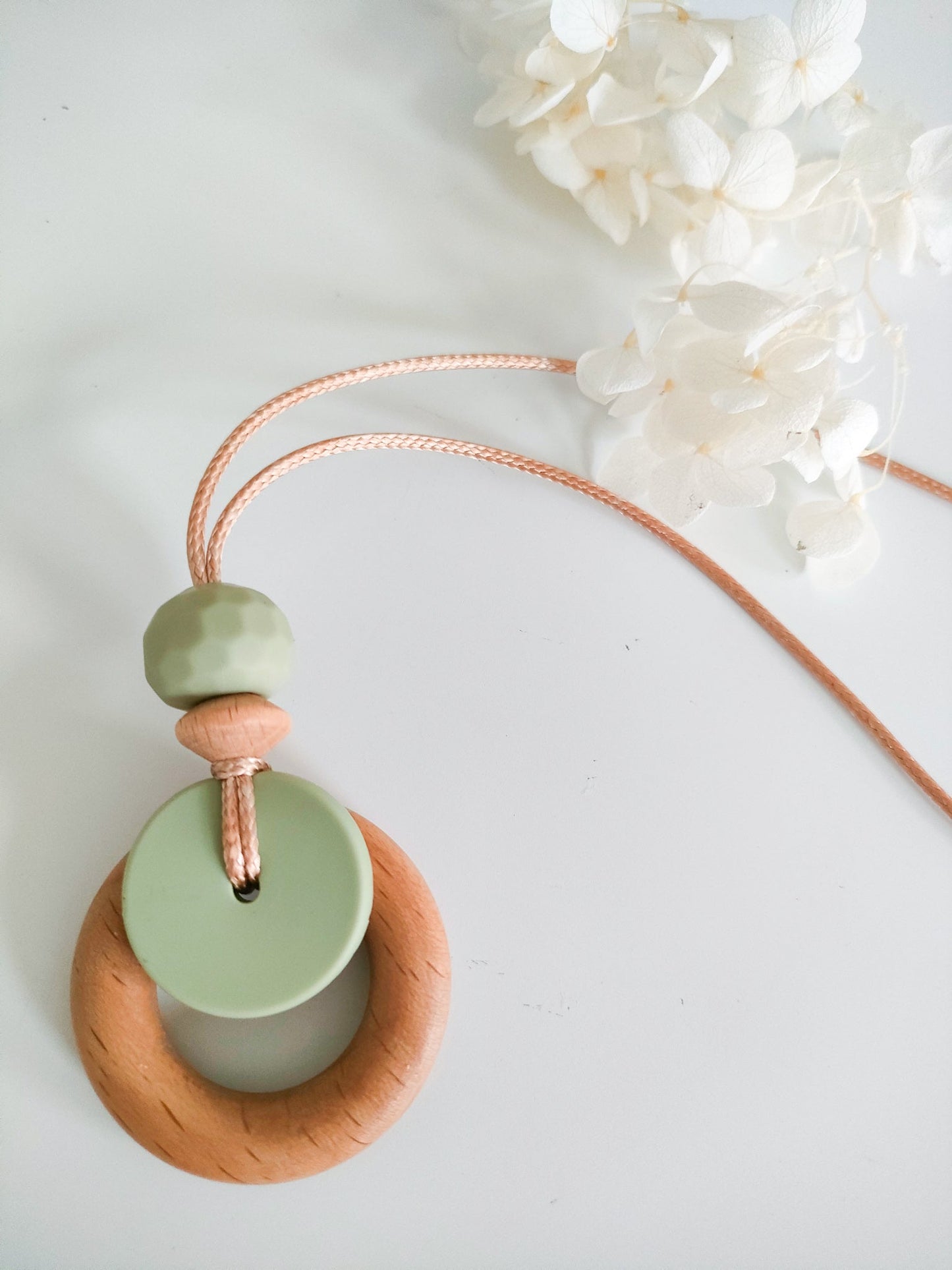 Lint sage green Grain Pendant - Blossy Breastfeeding, Teething and Fiddle Jewellery at its finest.