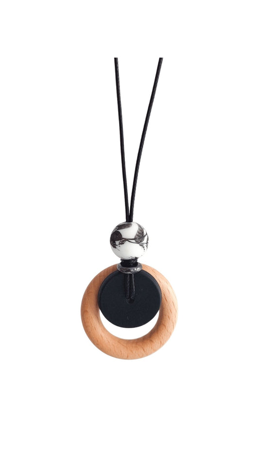 Mono Bloom black and white floral necklace with wooden ring