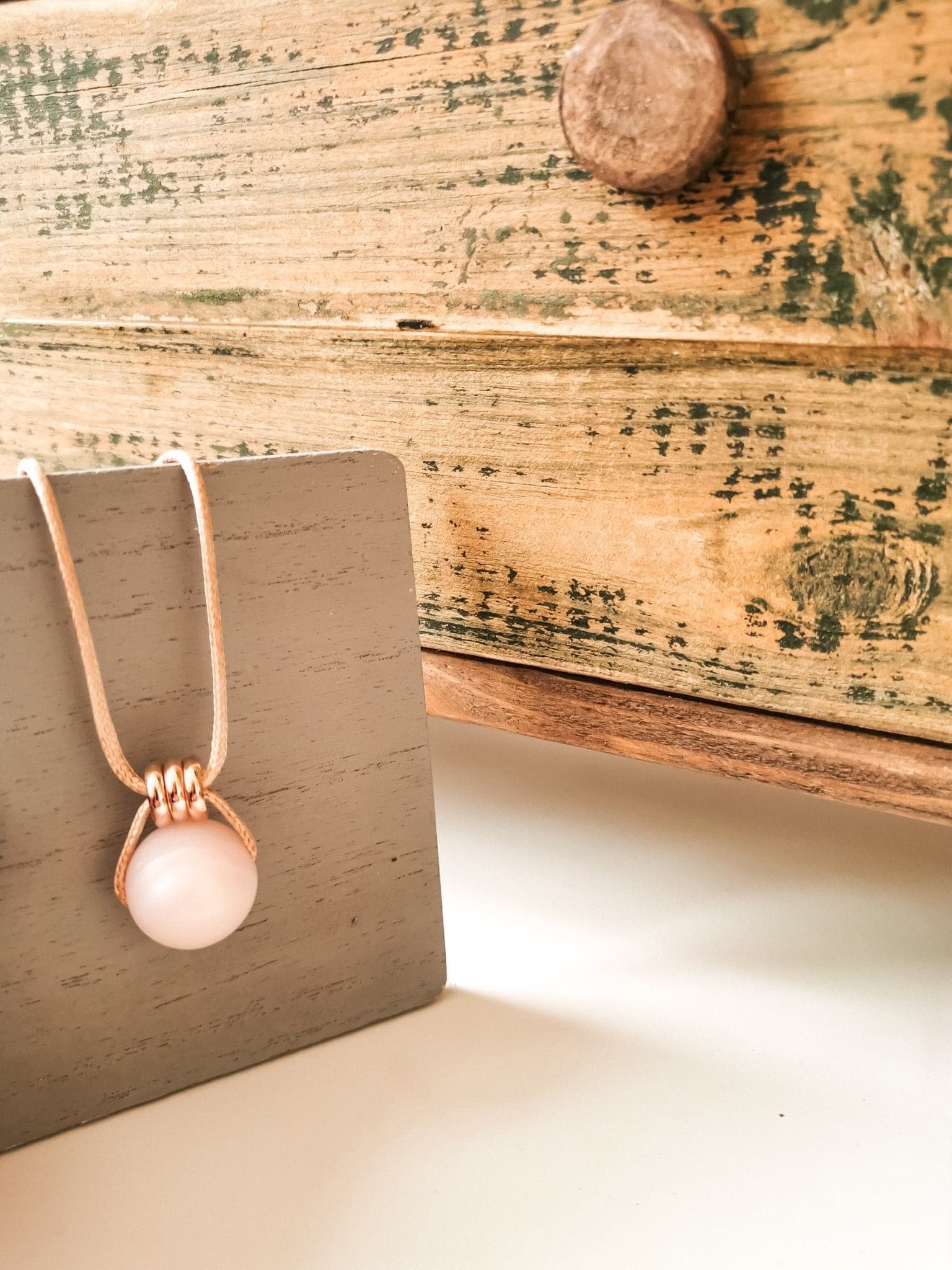 Rose pearl Pendant with pink silicone bead and rose gold detail.